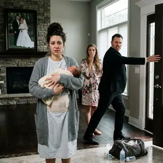Three days after my emergency C-section, I came home carrying our newborn and found my husband kissing another woman in our living room. He pointed at the door and said, “Take the baby and get out of my mansion.” I was still bleeding, but I smiled. “Your mansion?” I whispered. Then I called the attorney whose name was already on every deed.